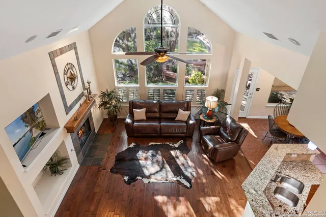a living room with furniture or fireplace and a chandelier
