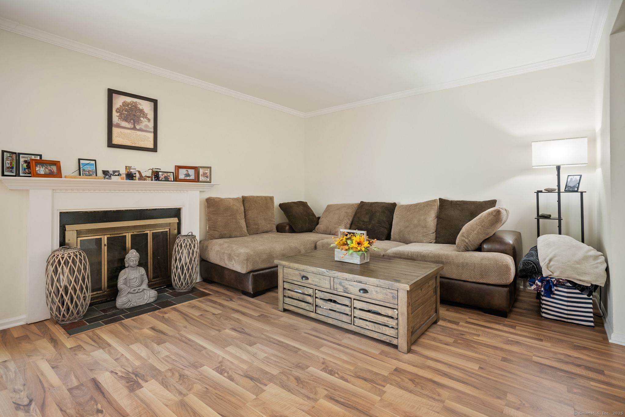 246 Reeds Gap Road, Unit 1D North Branford, CT 06472 - Photo 12 of 35 a living room with furniture and a fireplace