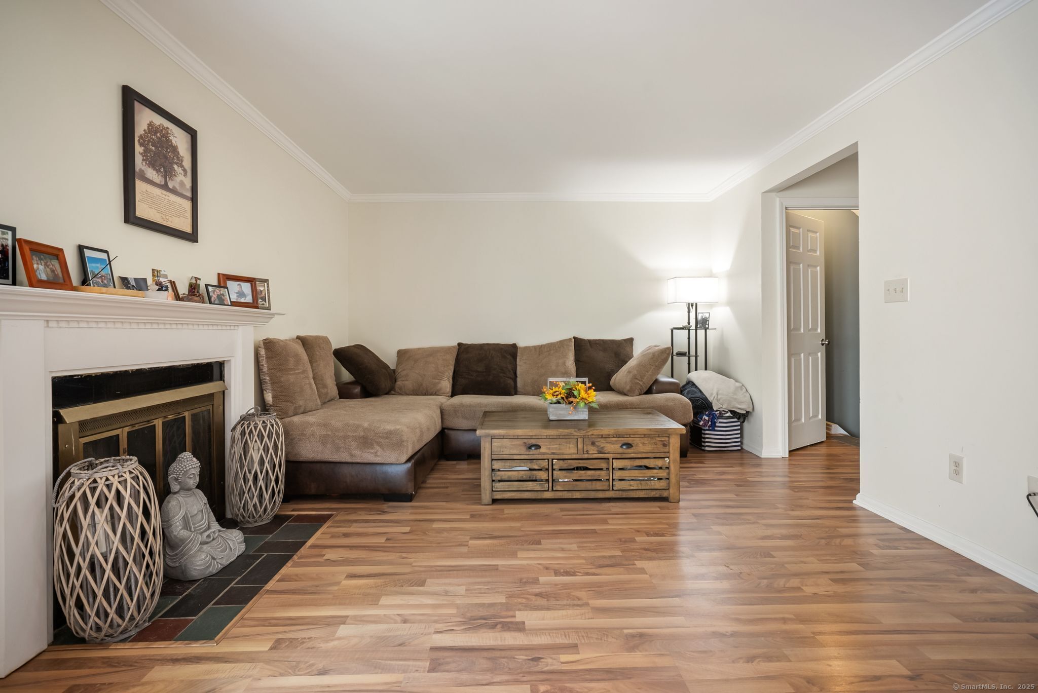 246 Reeds Gap Road, Unit 1D North Branford, CT 06472 - Photo 13 of 35 a living room with furniture or couch and a fireplace