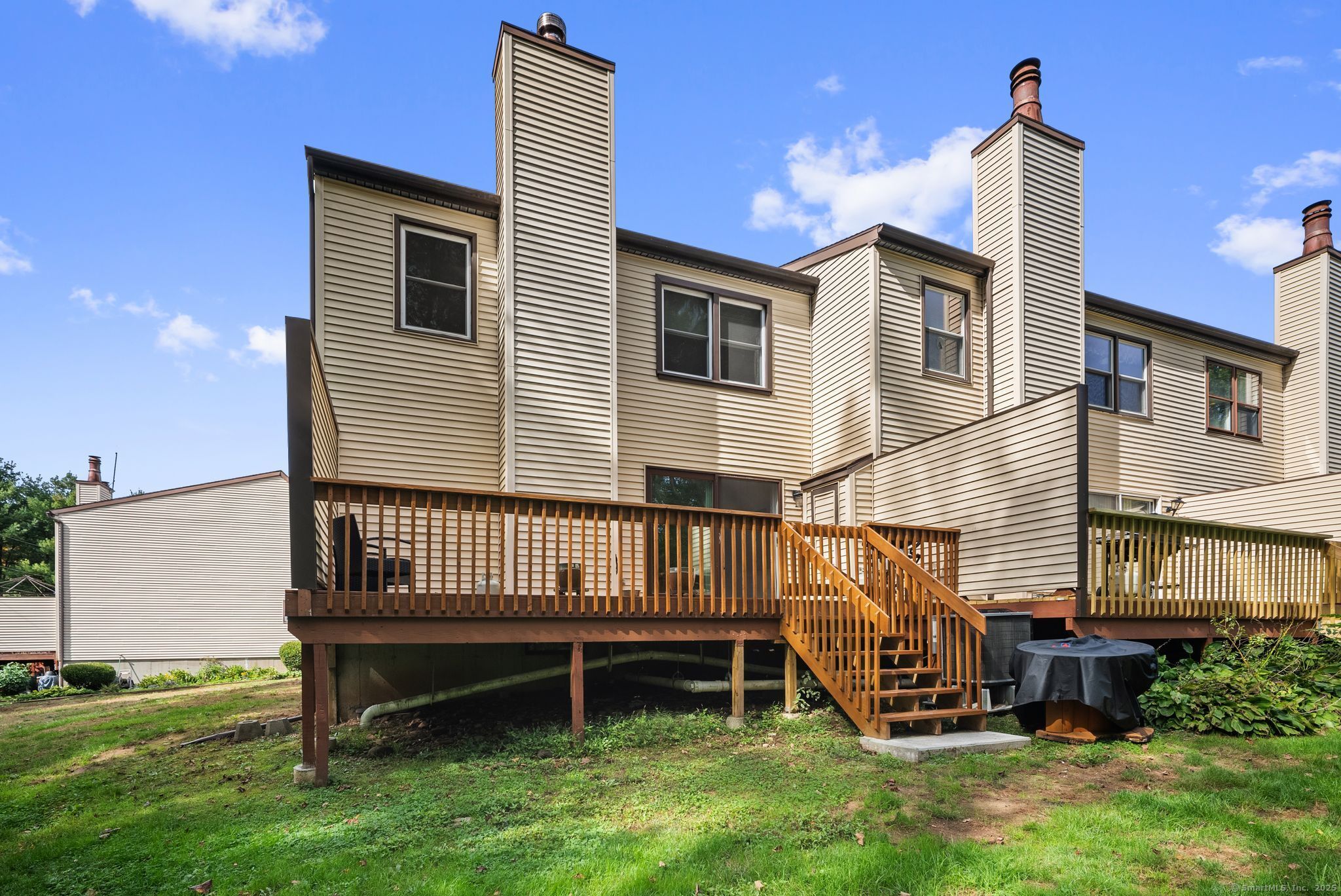 246 Reeds Gap Road, Unit 1D North Branford, CT 06472 - Photo 34 of 35 a view of a house with a yard
