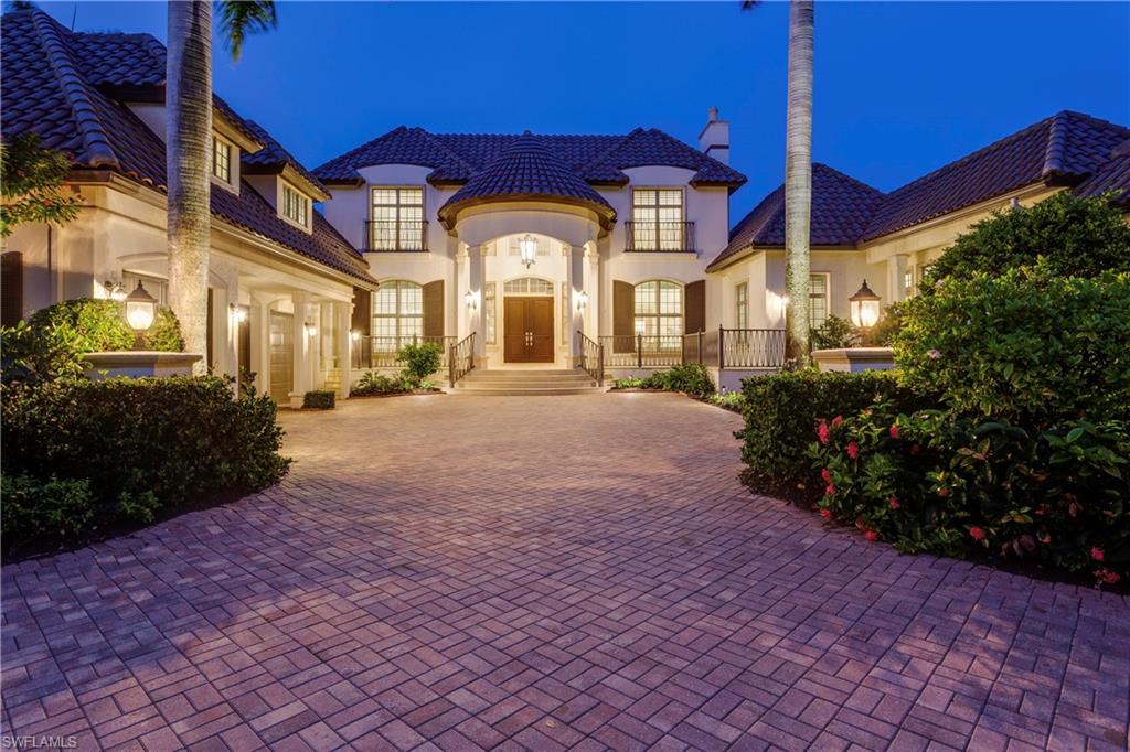 2595 Half Moon Walk Naples, FL 34102 - Photo 34 of 35 a view of a house with a yard