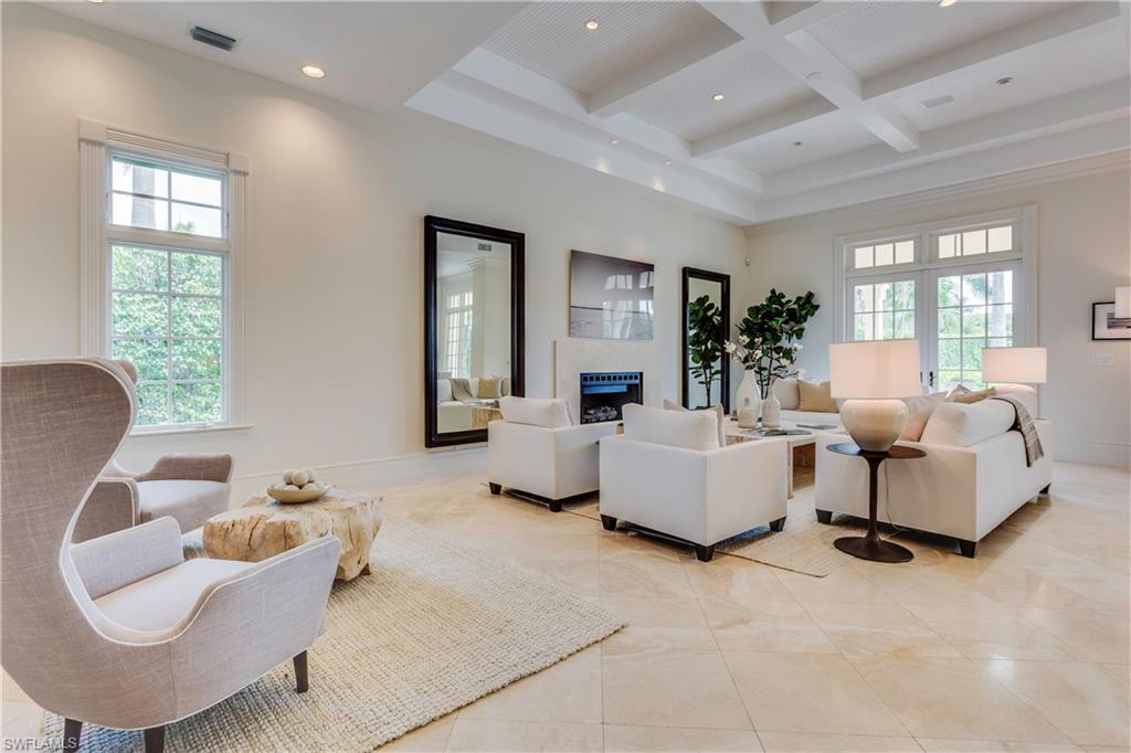 2595 Half Moon Walk Naples, FL 34102 - Photo 6 of 35 a living room with furniture and a large window