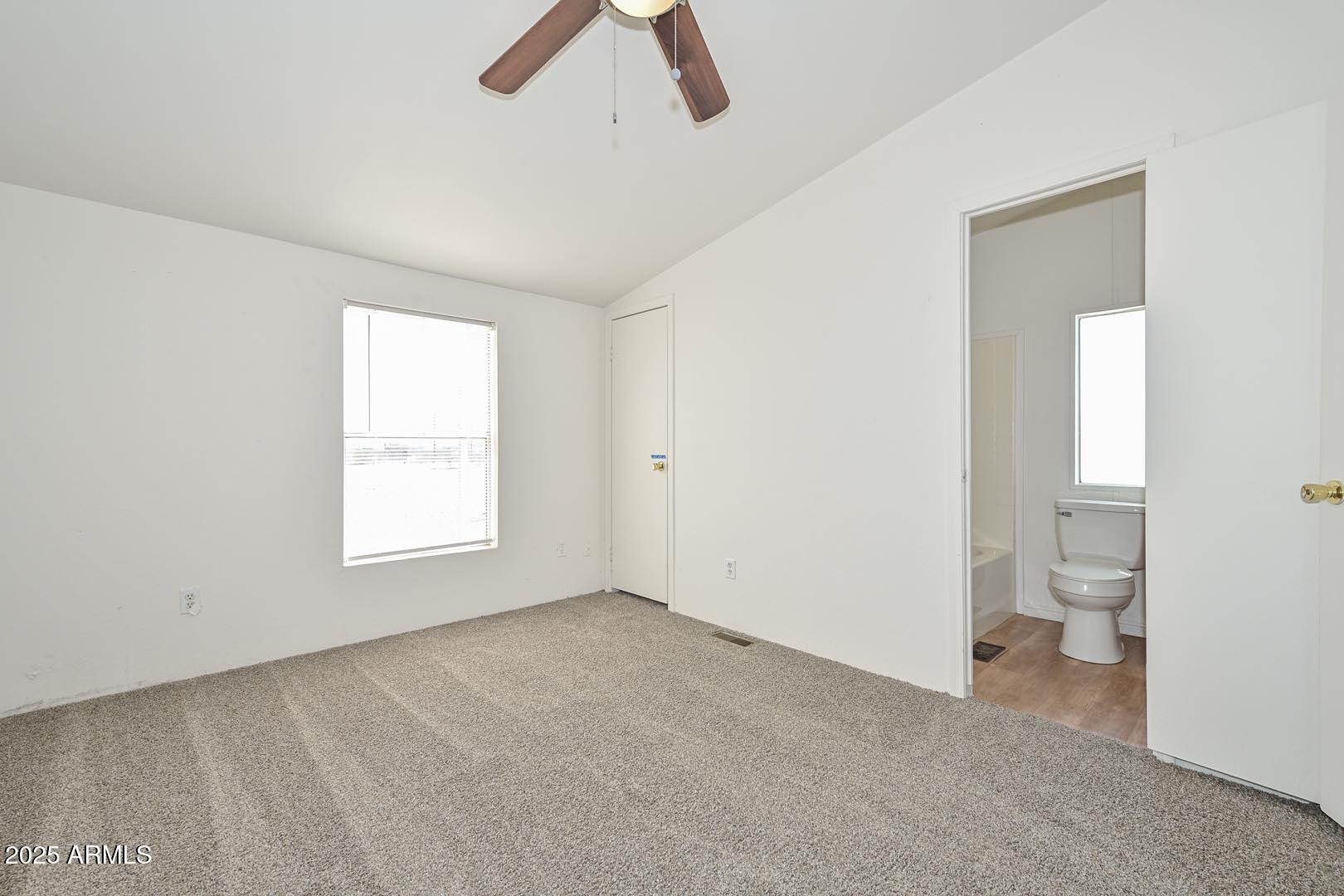 36608 West Lower Buckeye Road Tonopah, AZ 85354 - Photo 21 of 39 a big room with windows and closet