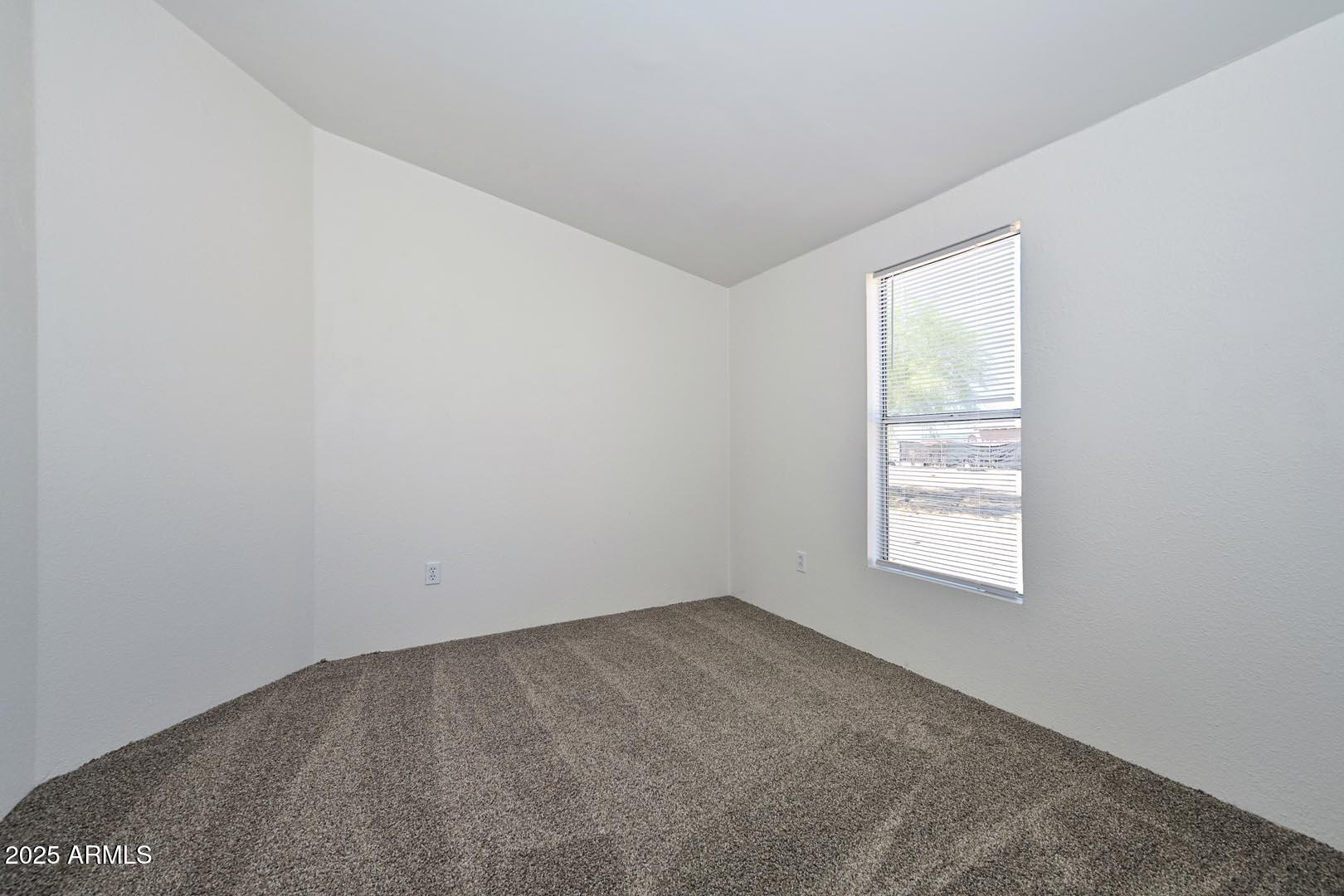 36608 West Lower Buckeye Road Tonopah, AZ 85354 - Photo 31 of 39 an empty room with a window