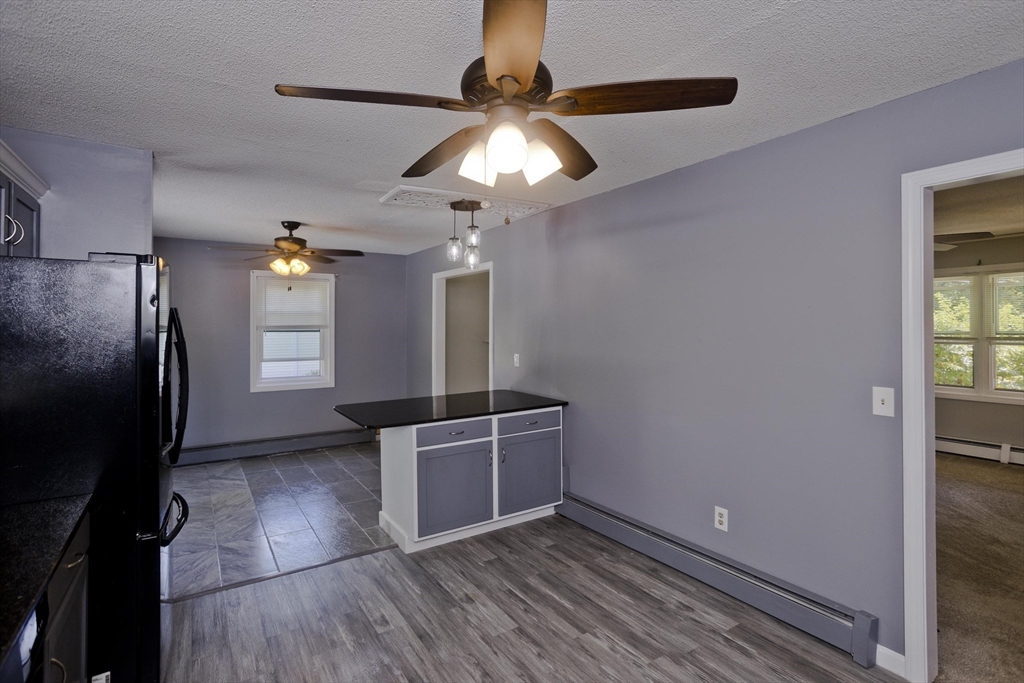 5 Michael Drive Enfield, CT 06082 - Photo 17 of 38 a view of empty room with wooden floor