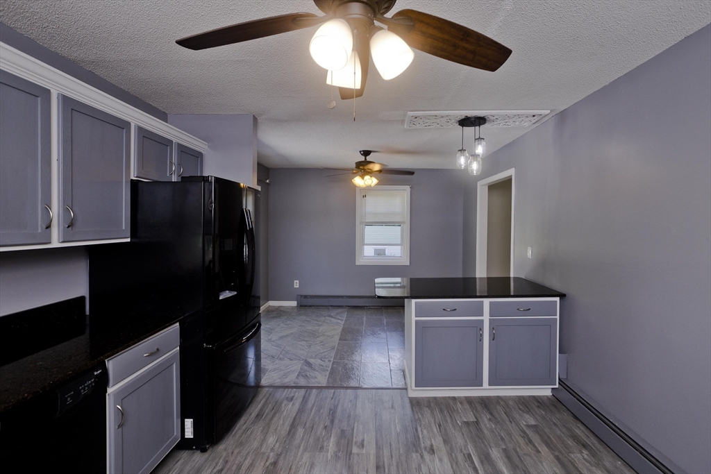 5 Michael Drive Enfield, CT 06082 - Photo 18 of 38 a kitchen with a sink stainless steel appliances and cabinets