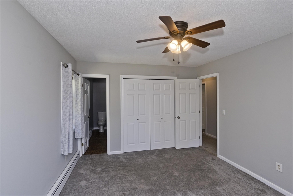 5 Michael Drive Enfield, CT 06082 - Photo 24 of 38 a view of room with window and ceiling fan