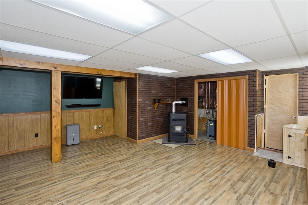 5 Michael Drive Enfield, CT 06082 - Photo 32 of 38 a view of a livingroom with a flat screen tv