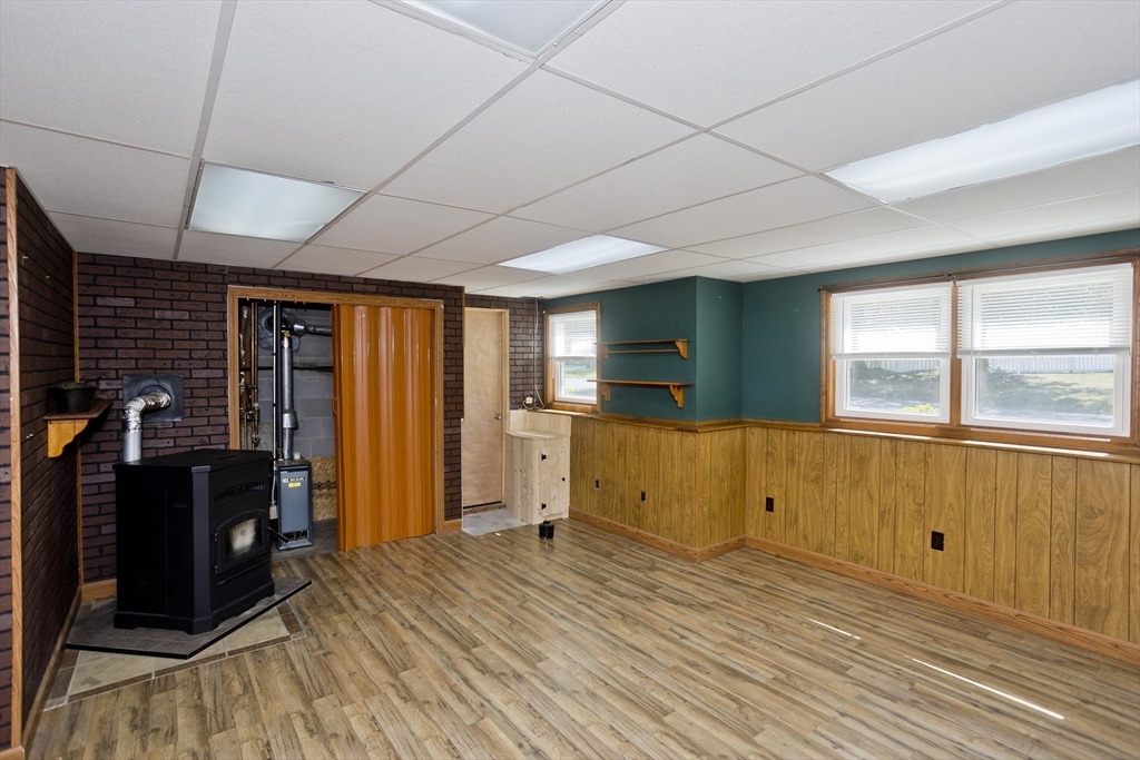 5 Michael Drive Enfield, CT 06082 - Photo 34 of 38 a view of a livingroom with wooden floor and a window