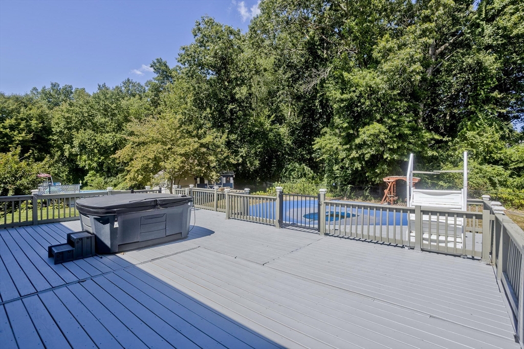 5 Michael Drive Enfield, CT 06082 - Photo 37 of 38 a view of a terrace with a bench