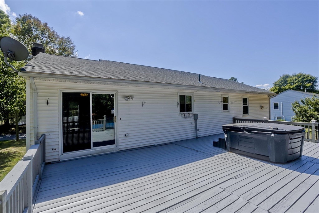 5 Michael Drive Enfield, CT 06082 - Photo 38 of 38 a living room with wooden floor and furniture