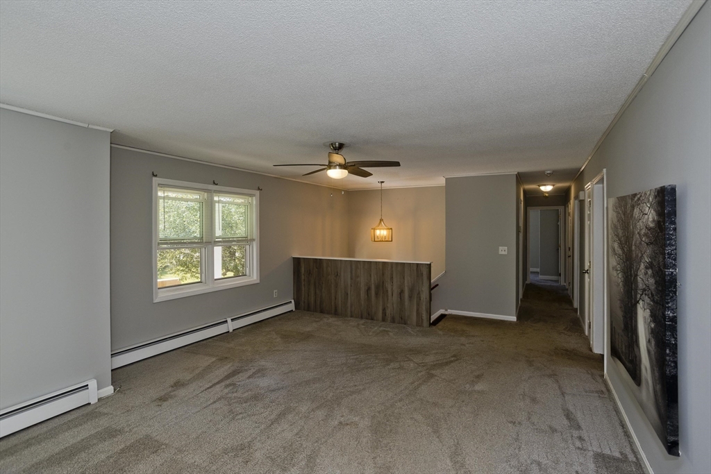 5 Michael Drive Enfield, CT 06082 - Photo 7 of 38 a view of an empty room with a window