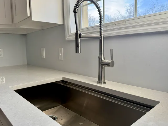 a view of a room with a flat screen tv