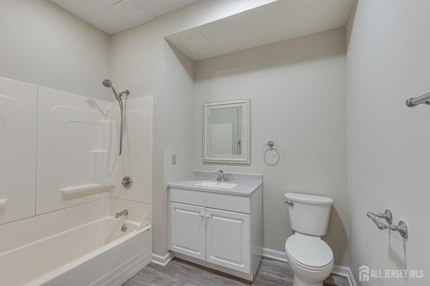 160 Durham Avenue, Unit 305 Metuchen, NJ 08840 - Photo 13 of 39 a bathroom with a sink toilet and shower