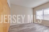 160 Durham Avenue, Unit 305 Metuchen, NJ 08840 - Photo 23 of 39 a view of empty room with window