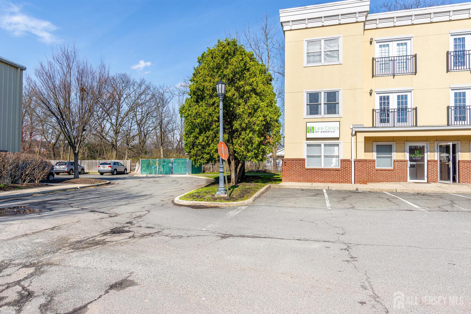 160 Durham Avenue, Unit 305 Metuchen, NJ 08840 - Photo 3 of 39 a view of street with houses
