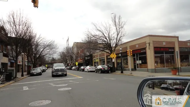 a view of a street with cars