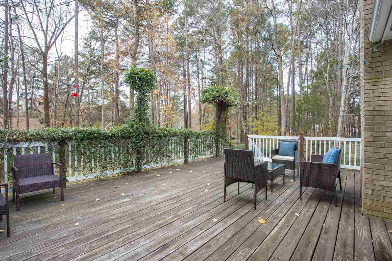 7704 Nugget Lane Raleigh, NC 27615 - Photo 8 of 18 to the expansive (24x16!) deck for entertaining.
