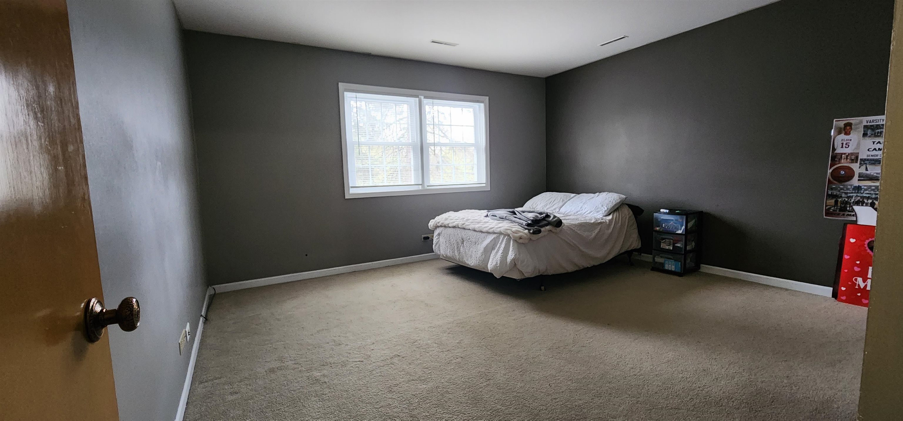 1450 Wing Street Elgin, IL 60123 - Photo 14 of 36 a bedroom with a bed and a window