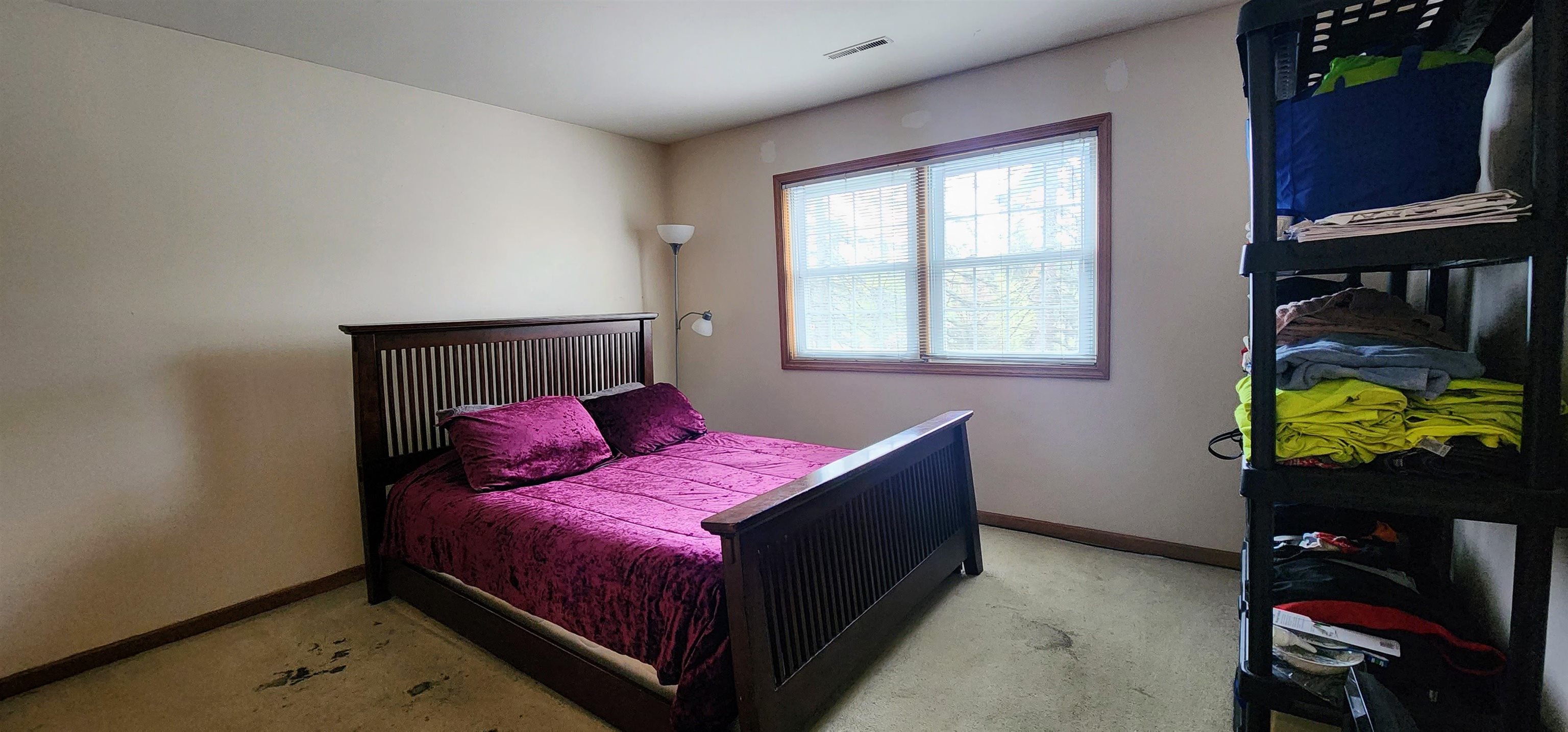 1450 Wing Street Elgin, IL 60123 - Photo 18 of 36 a living room with furniture and a window