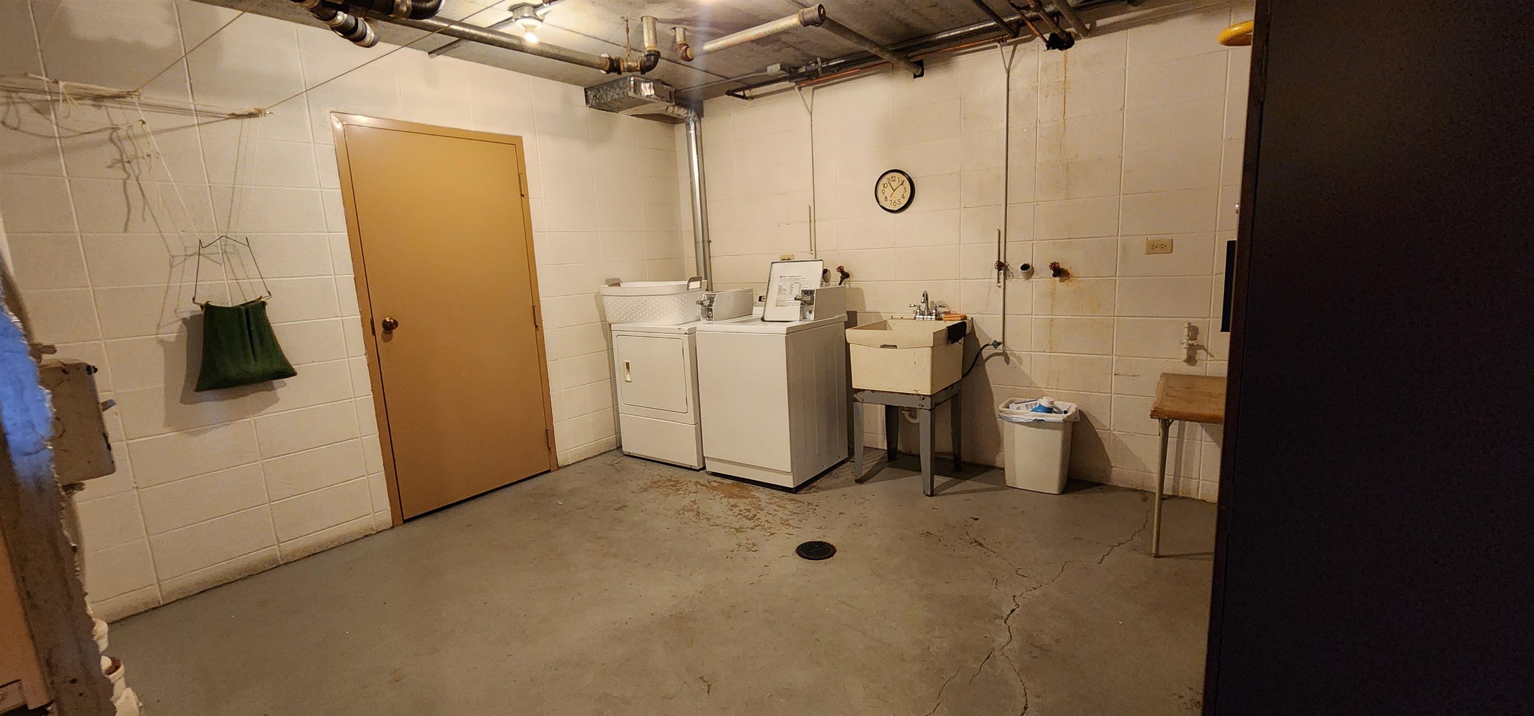 1450 Wing Street Elgin, IL 60123 - Photo 23 of 36 a view of a storage & utility room with a washer and dryer