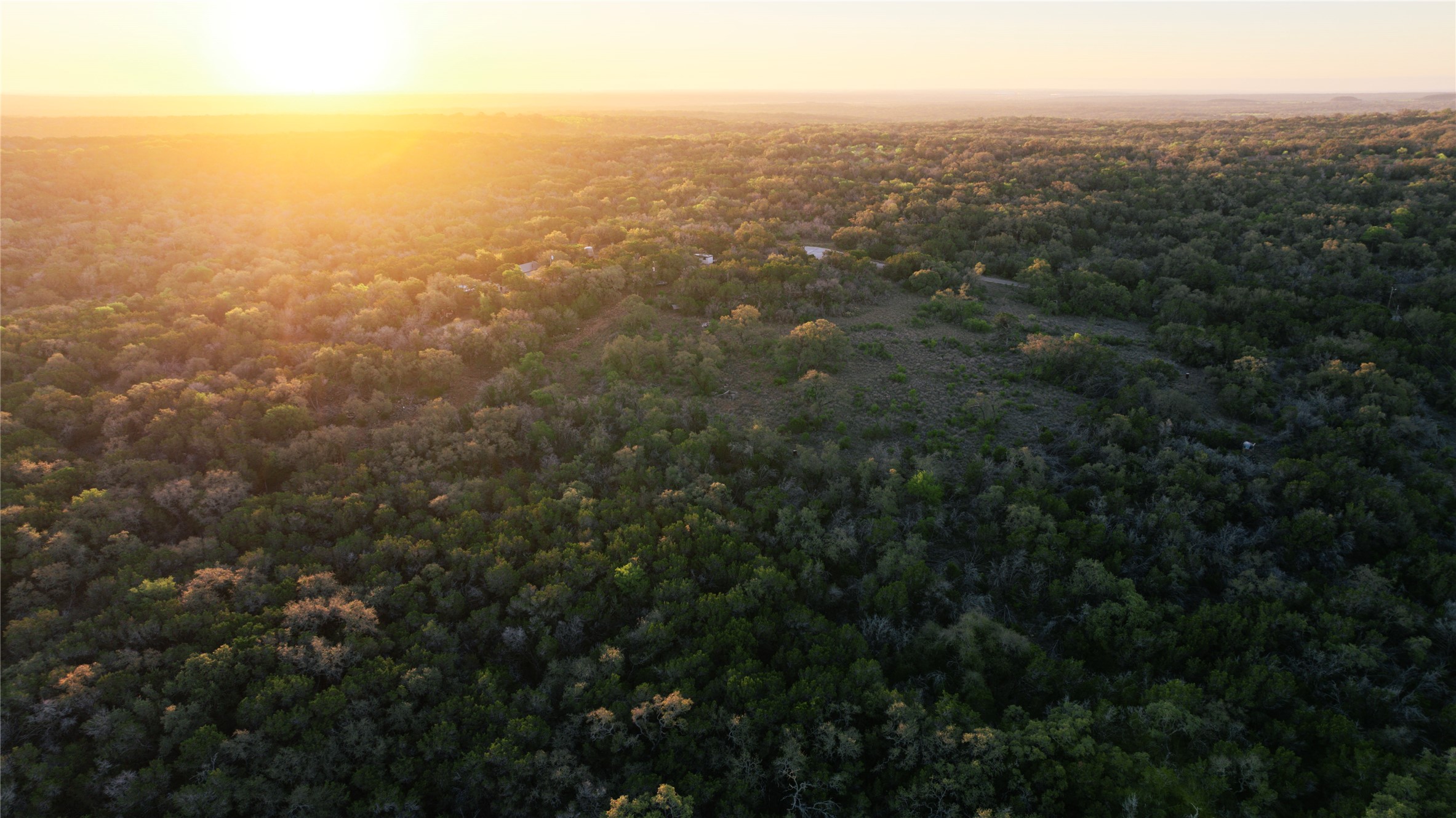 1901 Oak Grove Road San Marcos, TX 78666 - Photo 14 of 16 an aerial view of house with yard and mountain view in back