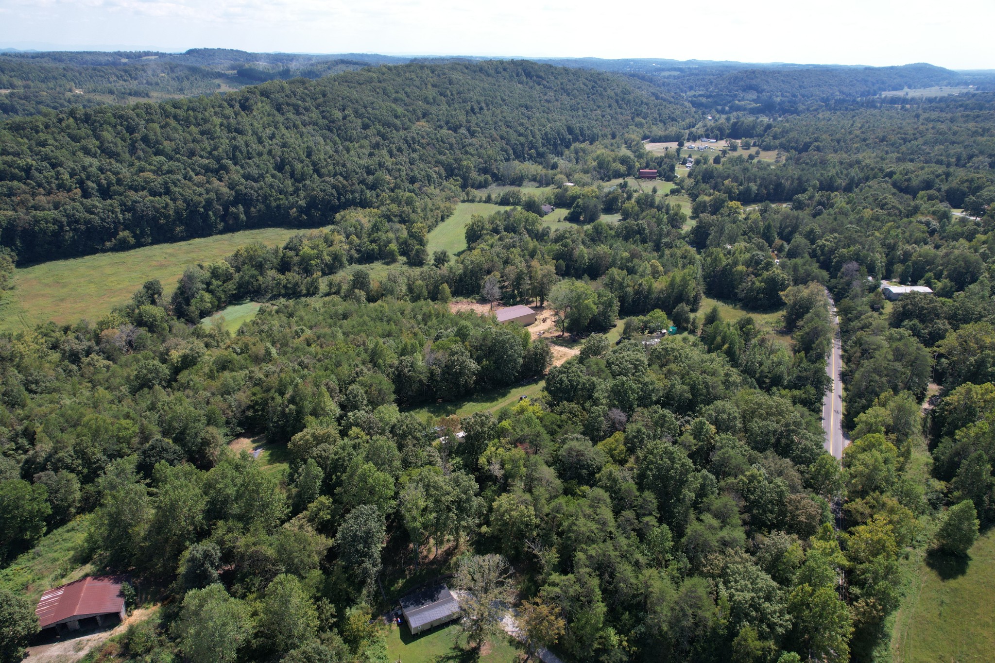 703 Sweetwater Road Philadelphia, TN 37846 - Photo 15 of 34 an aerial view of a house with a yard