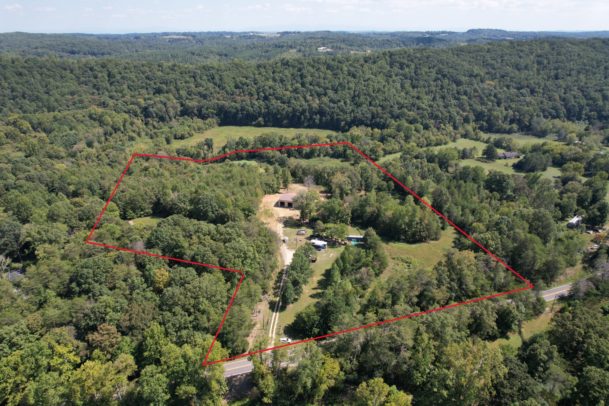 703 Sweetwater Road Philadelphia, TN 37846 - Photo 2 of 34 an aerial view of forest