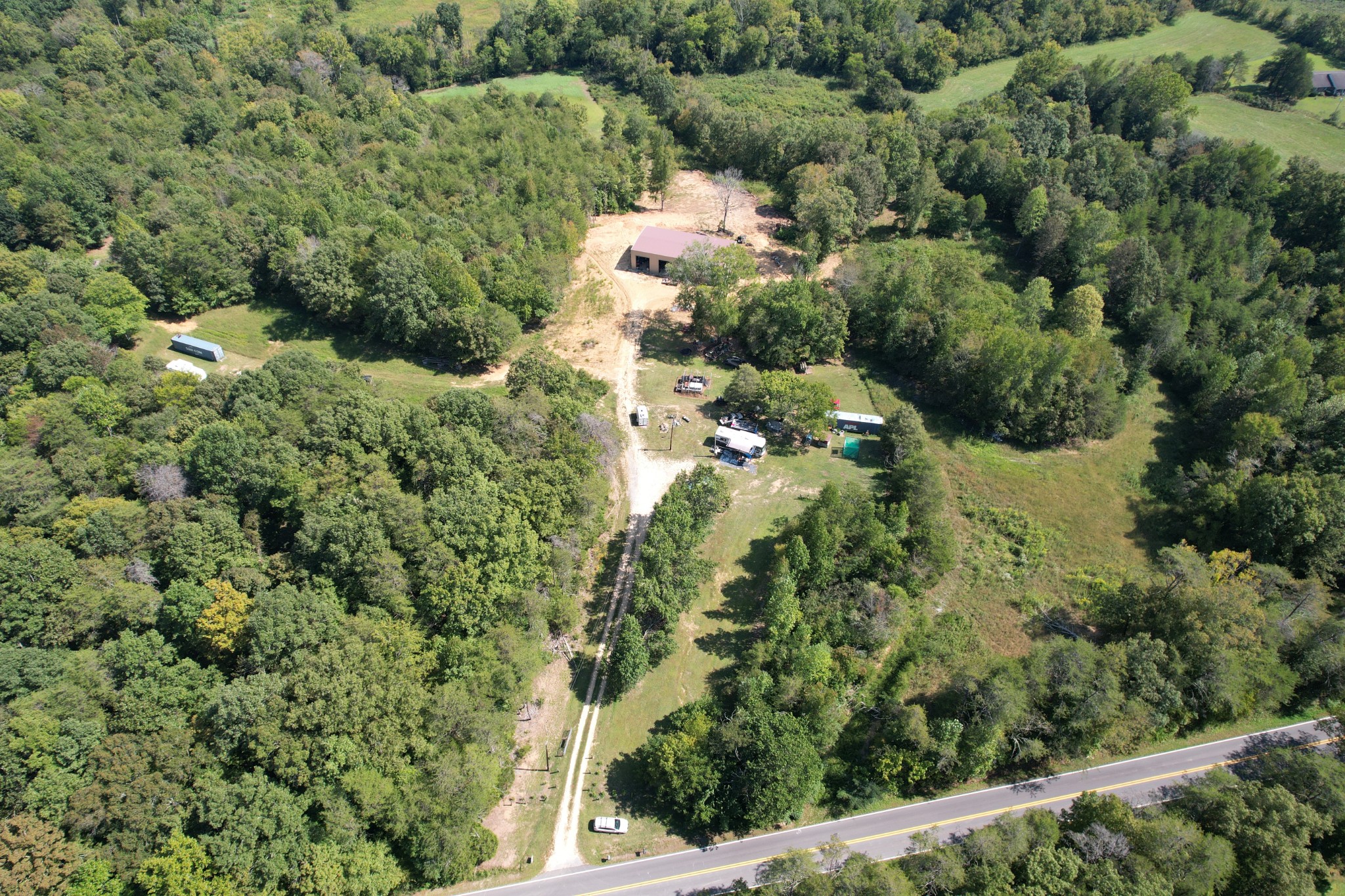 703 Sweetwater Road Philadelphia, TN 37846 - Photo 32 of 34 an aerial view of a house with a yard