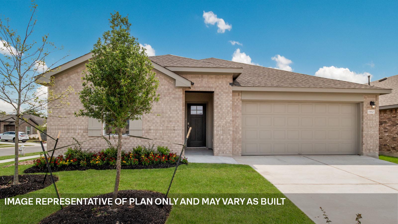 1824 Side Buster Trail Leander, TX 78641 - Photo 1 of 4 a front view of a house with a garden