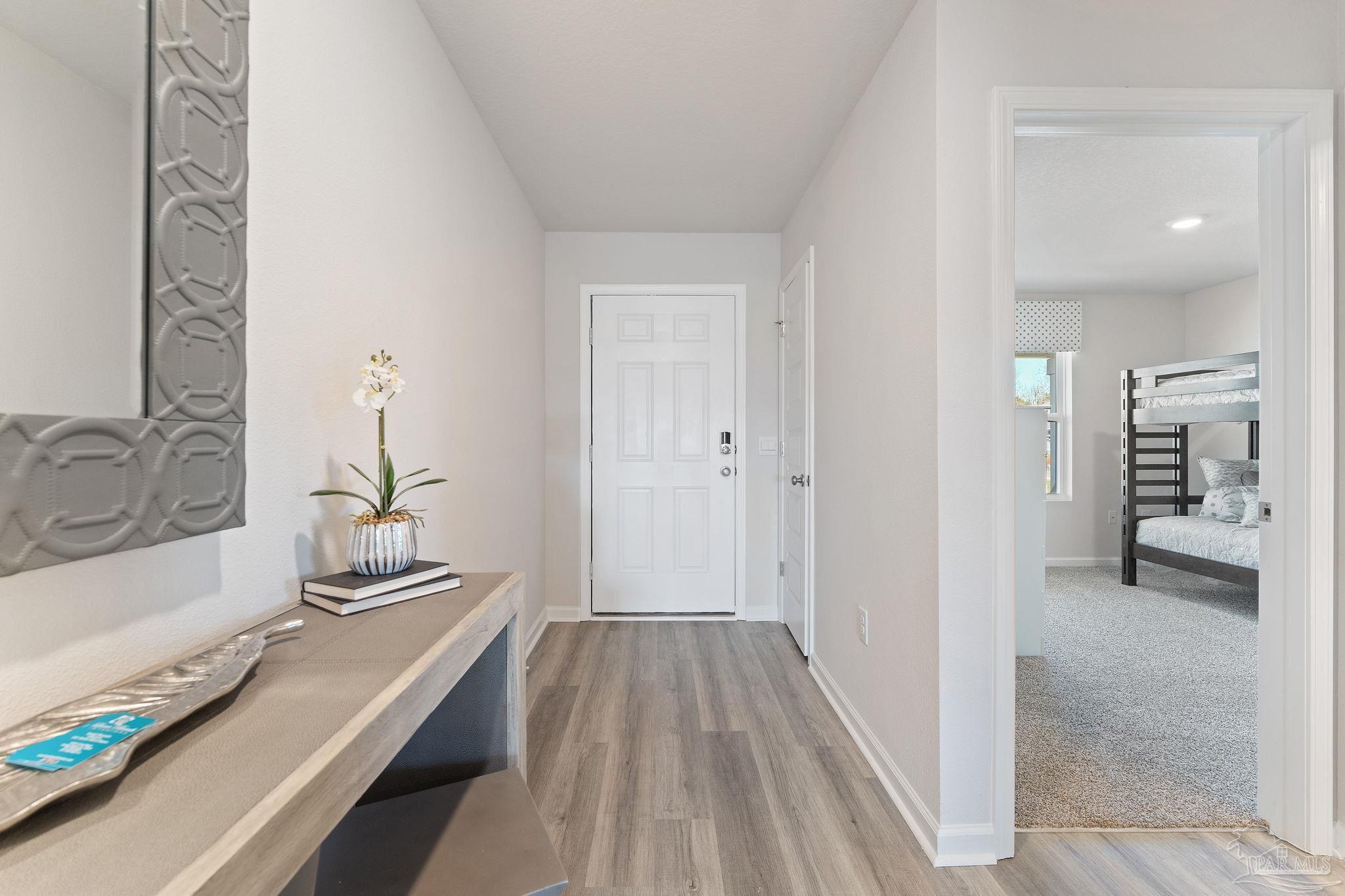 3302 Garganey Road Pace, FL 32571 - Photo 6 of 30 a view of a bathtub in a hallway
