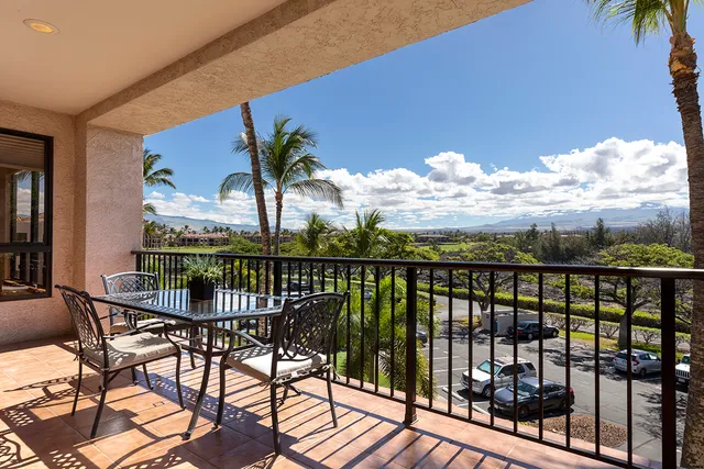 a view of a balcony with lake view and wooden floor