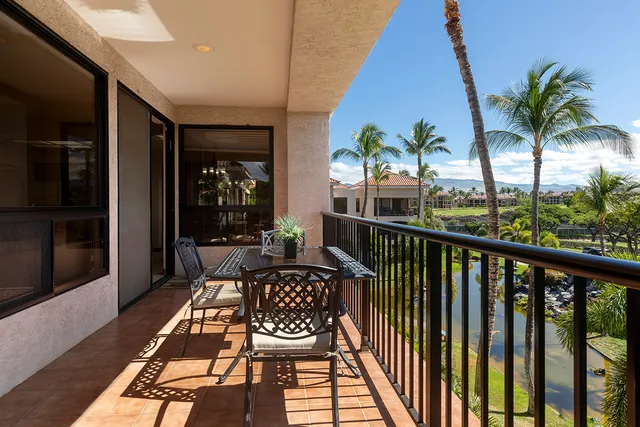 a workspace with furniture and a gate