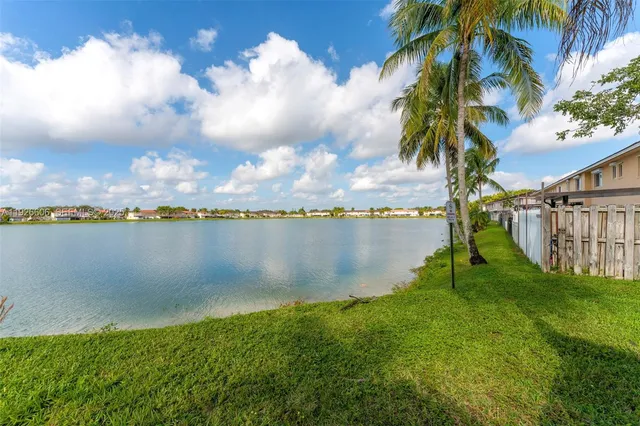 a view of a lake from a yard