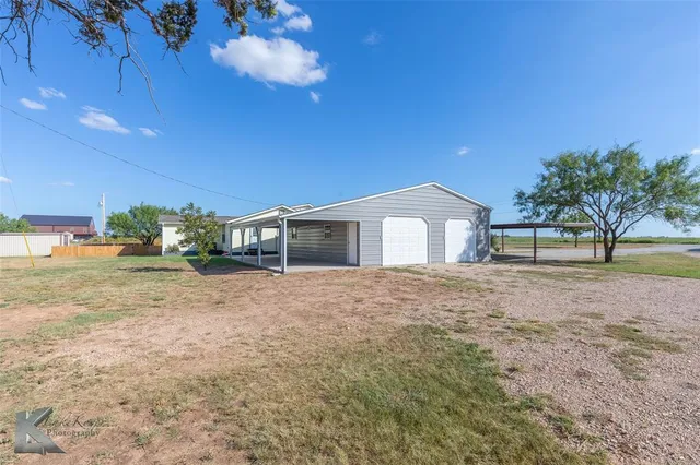 a view of parking garage with cars