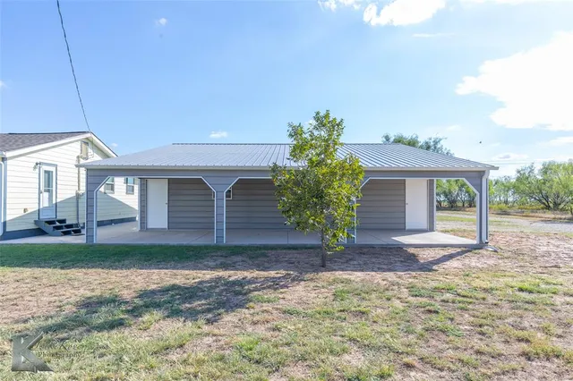 a view of street with houses