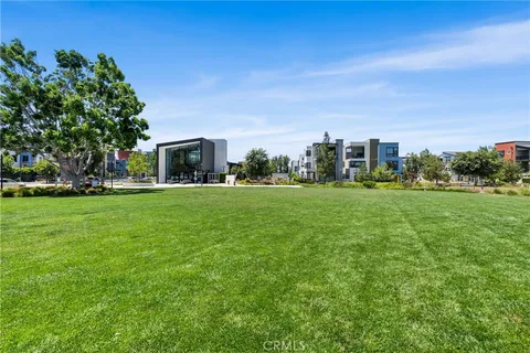 a view of a building with a big yard