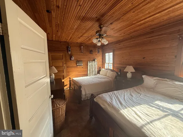 a dining room with furniture and windows