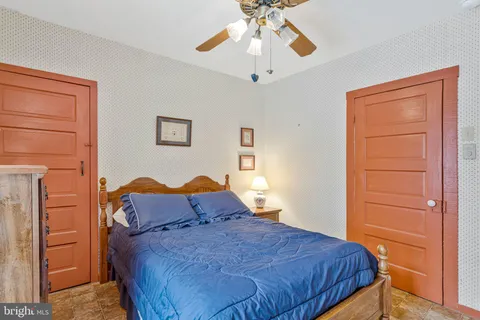 a bathroom with a sink and a large window