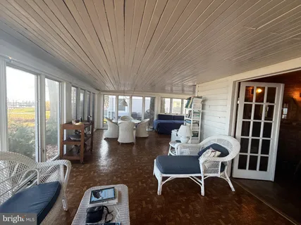 a view of a large body of water with lots of trees