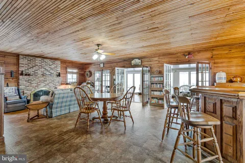 a bedroom with furniture and a chandelier