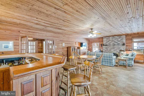 a view of a balcony with chairs