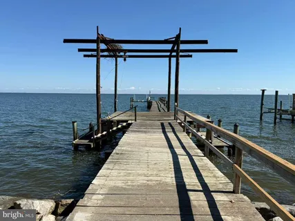 a view of balcony with wooden floor