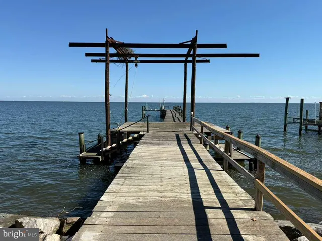 a view of balcony with wooden floor