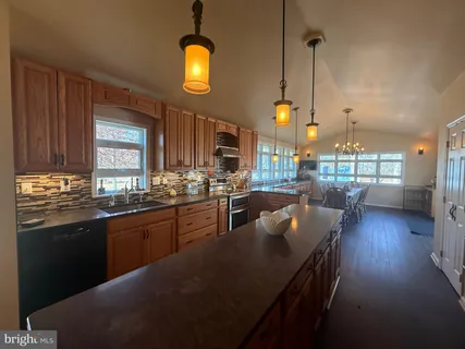 a white refrigerator freezer sitting inside of a kitchen