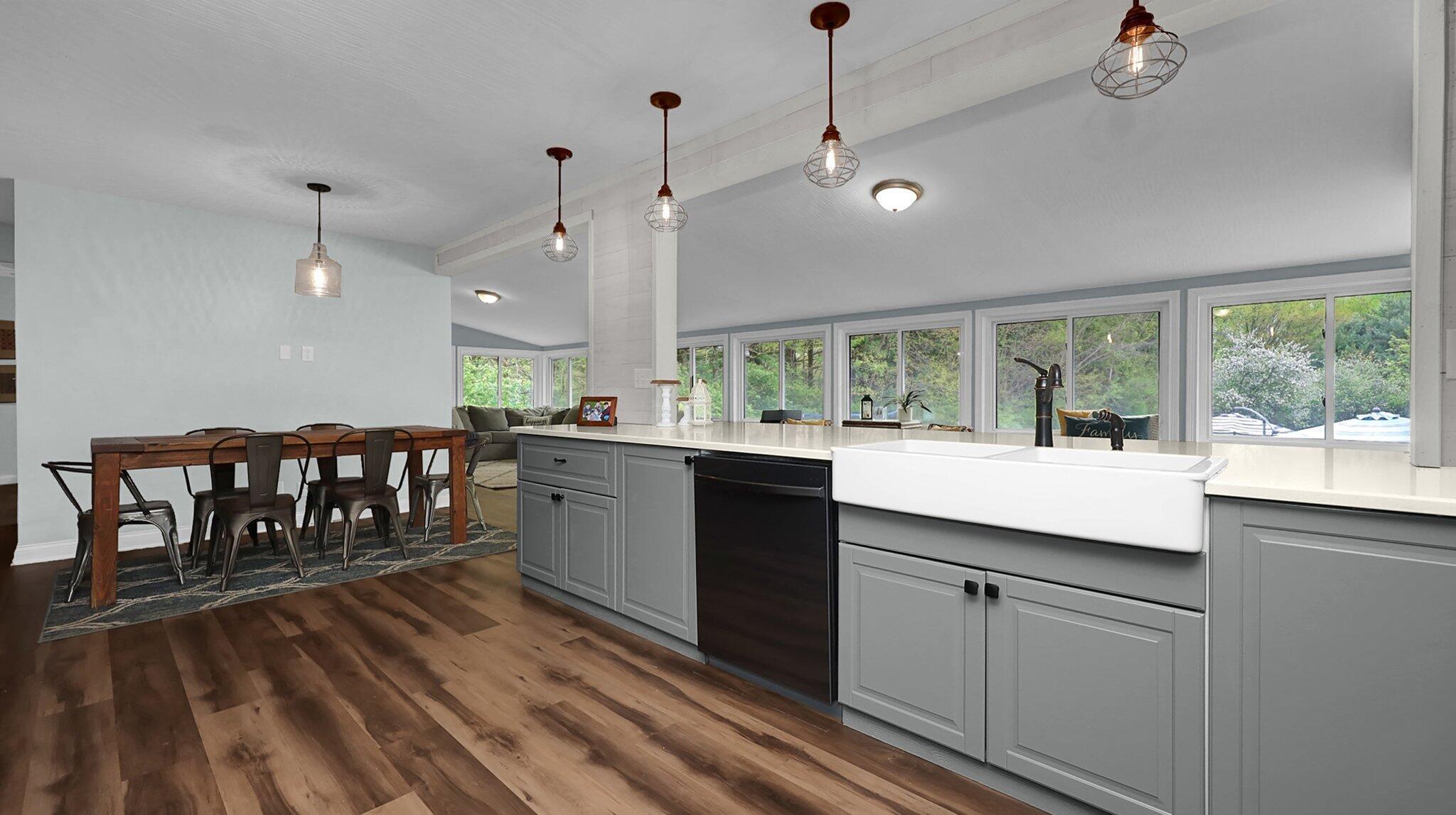 7790 Schott Road Westerville, OH 43081 - Photo 13 of 50 With cabinets galore and updated stainless steal appliances, you'll have no problem feeding a hungry crowd! Quart counters, custom backsplash, farmhouse sink, and so much more!