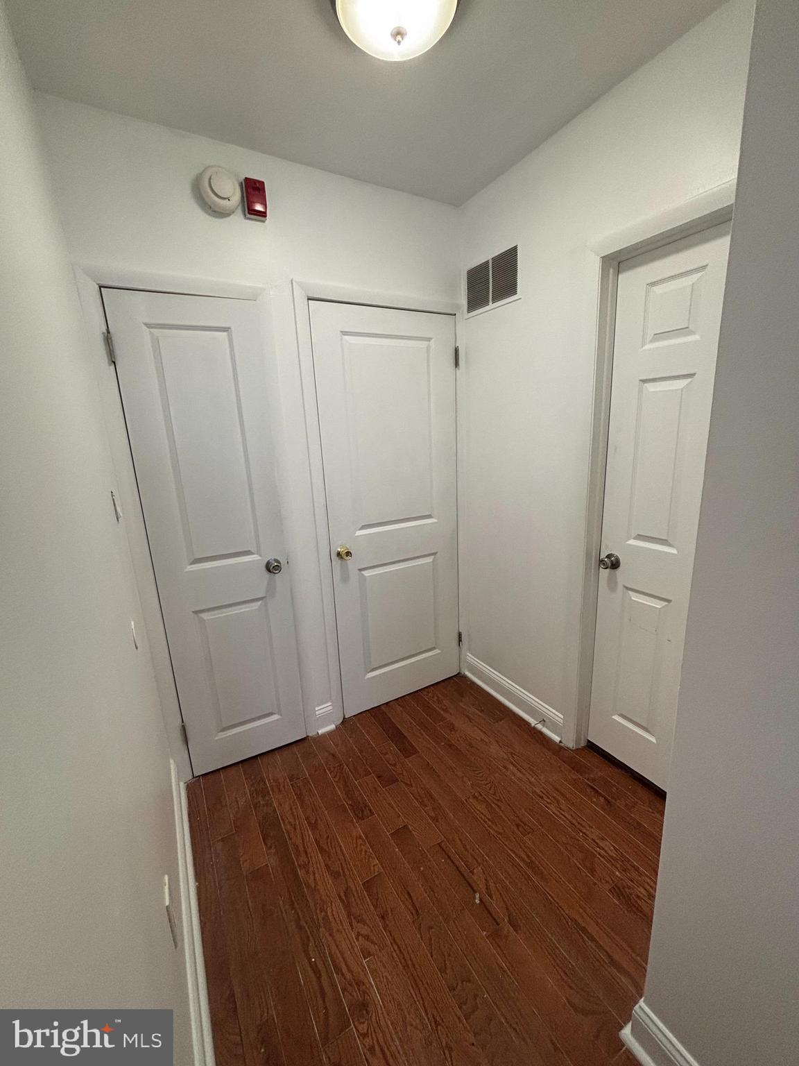 1501 South Newkirk Street Philadelphia, PA 19146 - Photo 2 of 2 an empty room with wooden floor and closet