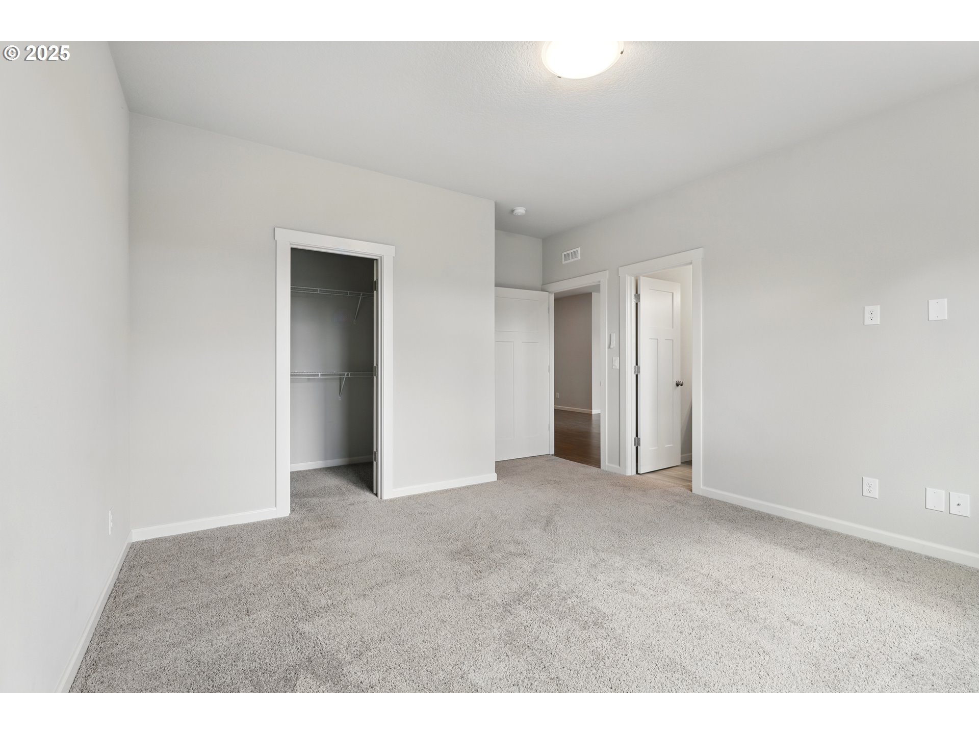 2582 Southwest Thomas Way Gresham, OR 97080 - Photo 20 of 36 a view of an empty room with closet and a window