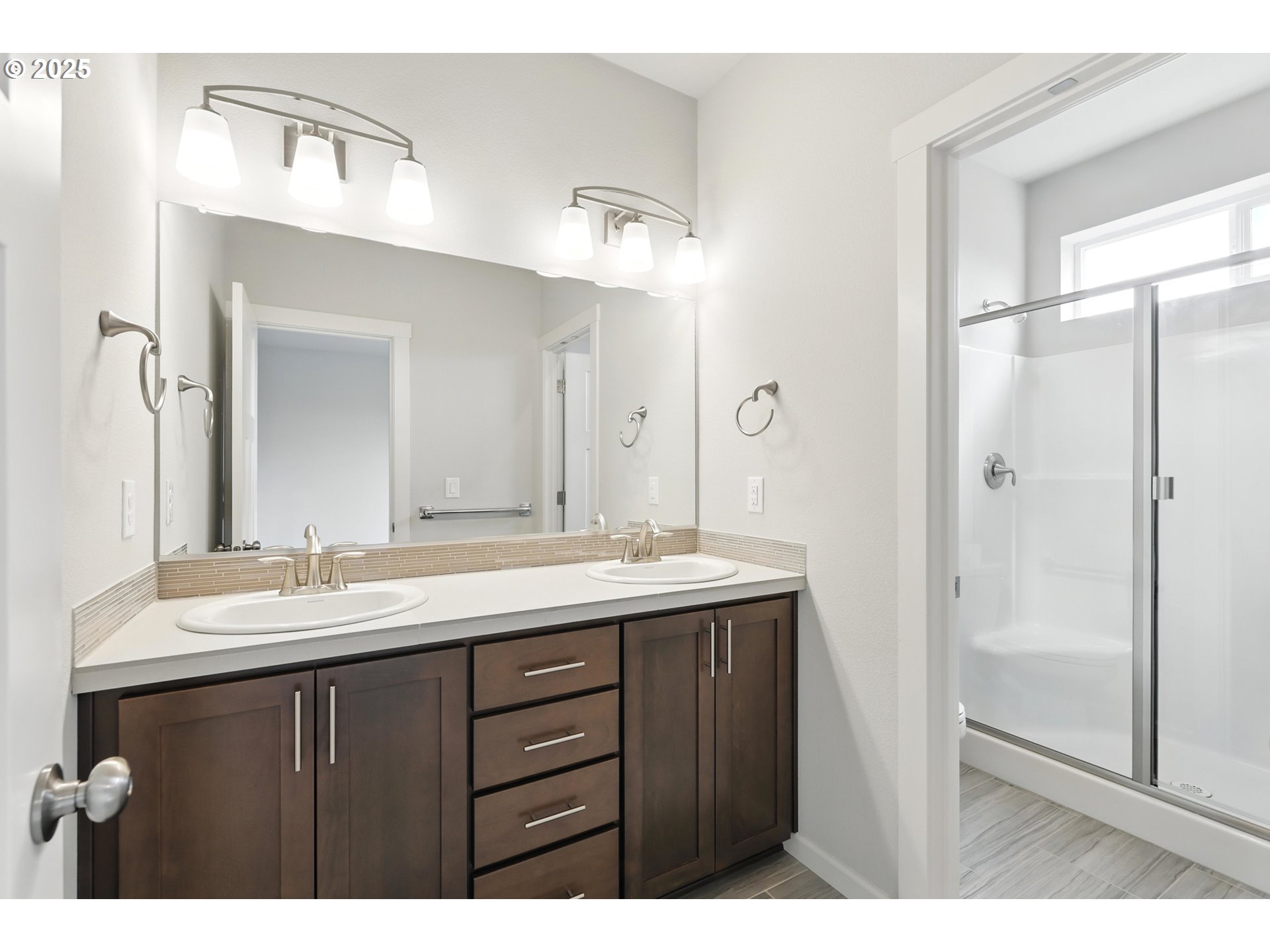 2582 Southwest Thomas Way Gresham, OR 97080 - Photo 22 of 36 a bathroom with a sink and a mirror