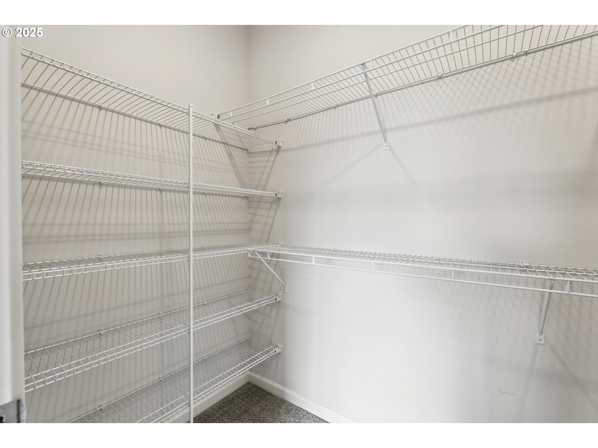 2582 Southwest Thomas Way Gresham, OR 97080 - Photo 24 of 36 a view of a room with racks on the wall